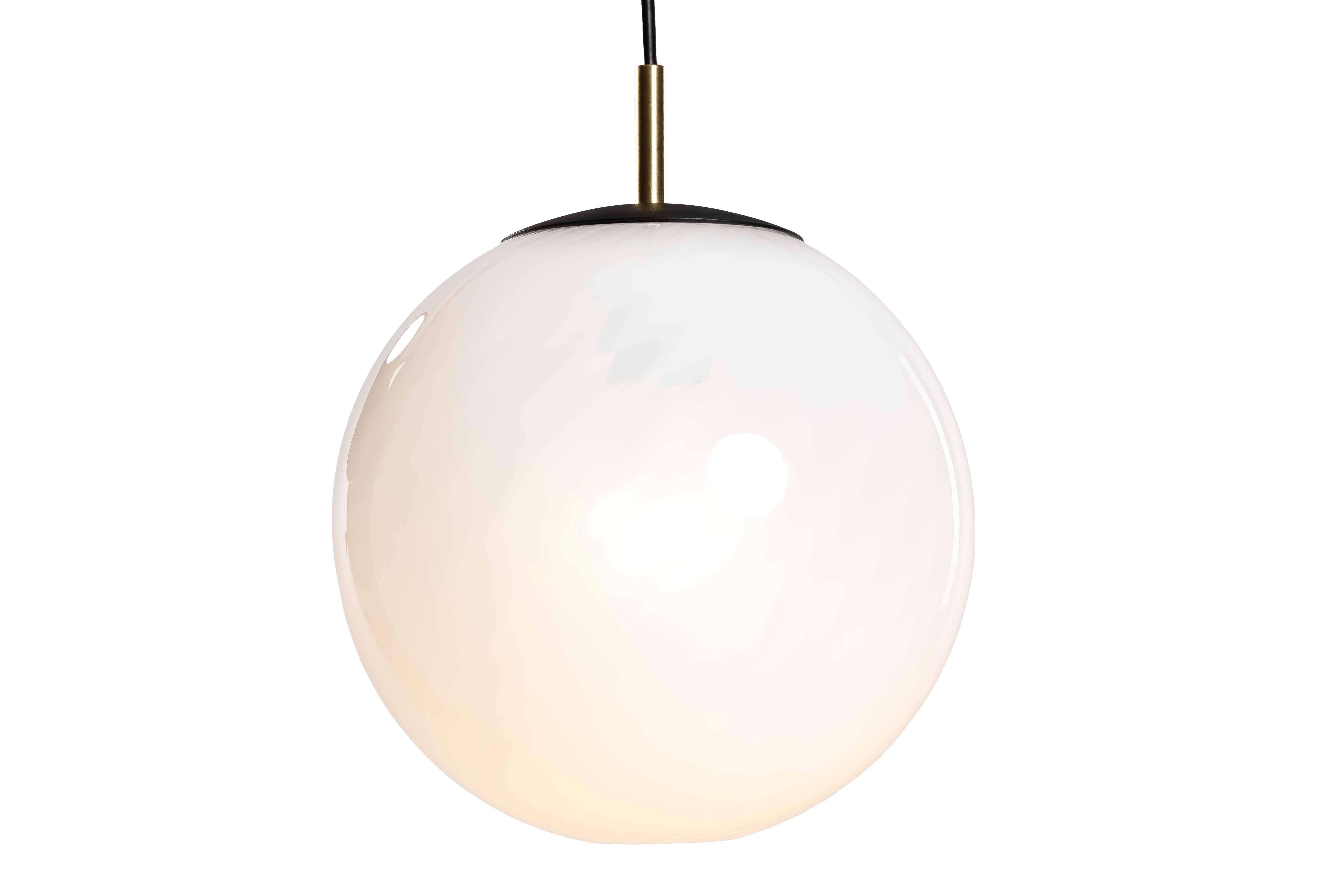 The new Astro range from Luminosa - a range of architectural glass lamps in translucent bone white with optical twist. Classical yet modern these little pearls suit just about every environment. Cord-set and matching canopy are powder-coated black