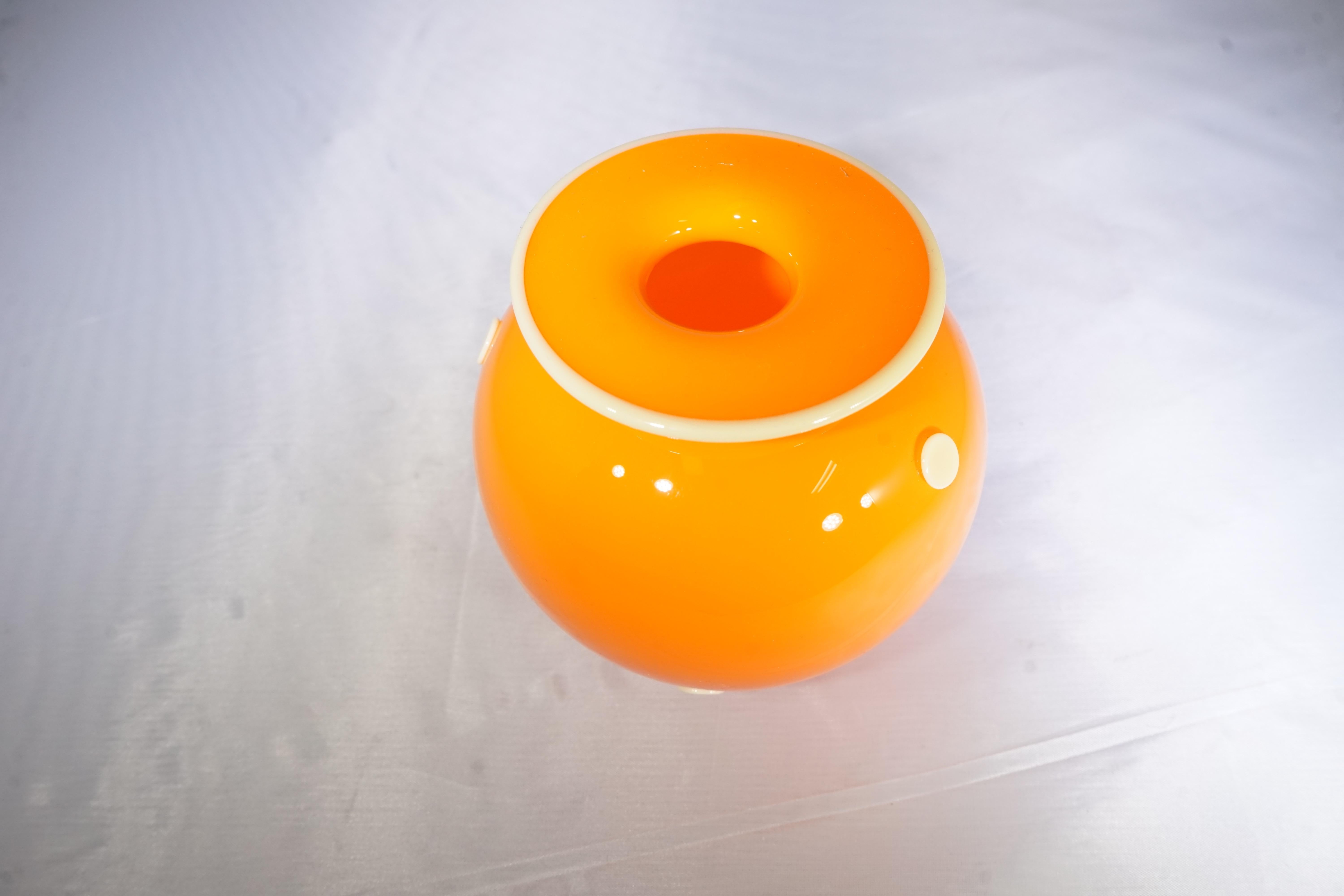 Contemporary large hand blown glass orange vase with buttercream dot detail, commissioned for Paris underground.