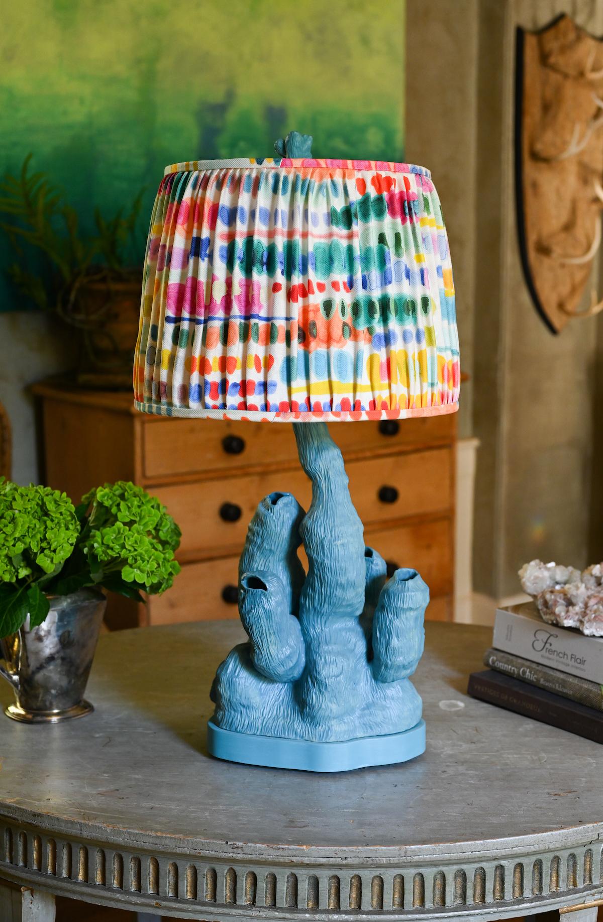 Contemporary ceramic studio made coral form lamp in turquoise. The lamp surface is carved to create a rich texture and under-glazed in a soft-matte to semi finish. The base is custom made and painted, and all hardware is live unfinished brass.

The