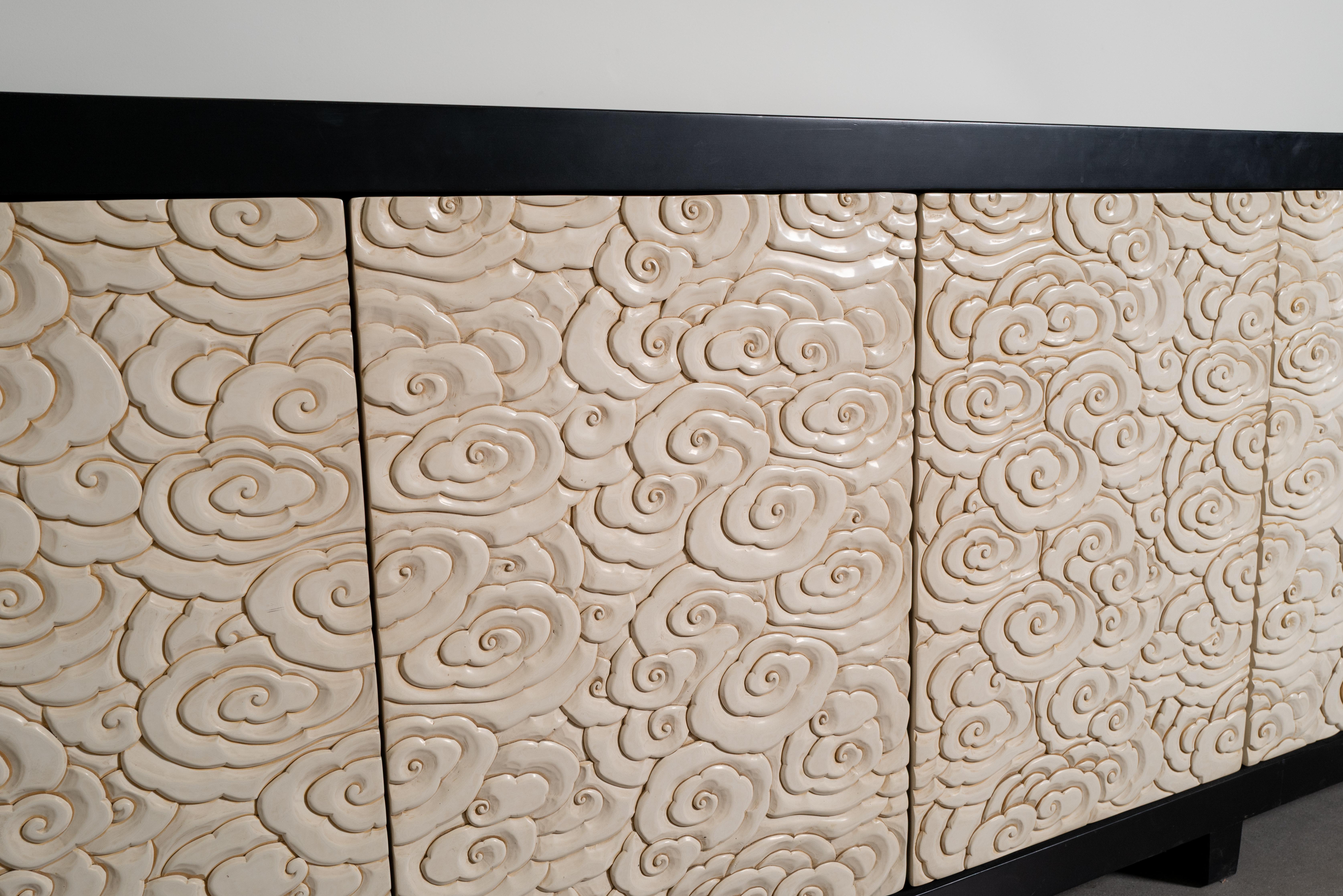 Cloud Design Buffet
4 Doors
Cream Lacquer
Hand Carved 
Lacquered Wood
Limited Edition
Contemporary
Each piece is individually crafted and is unique. 

Lacquer is a laborious and time-consuming process. After it is tapped from the trees, lacquer