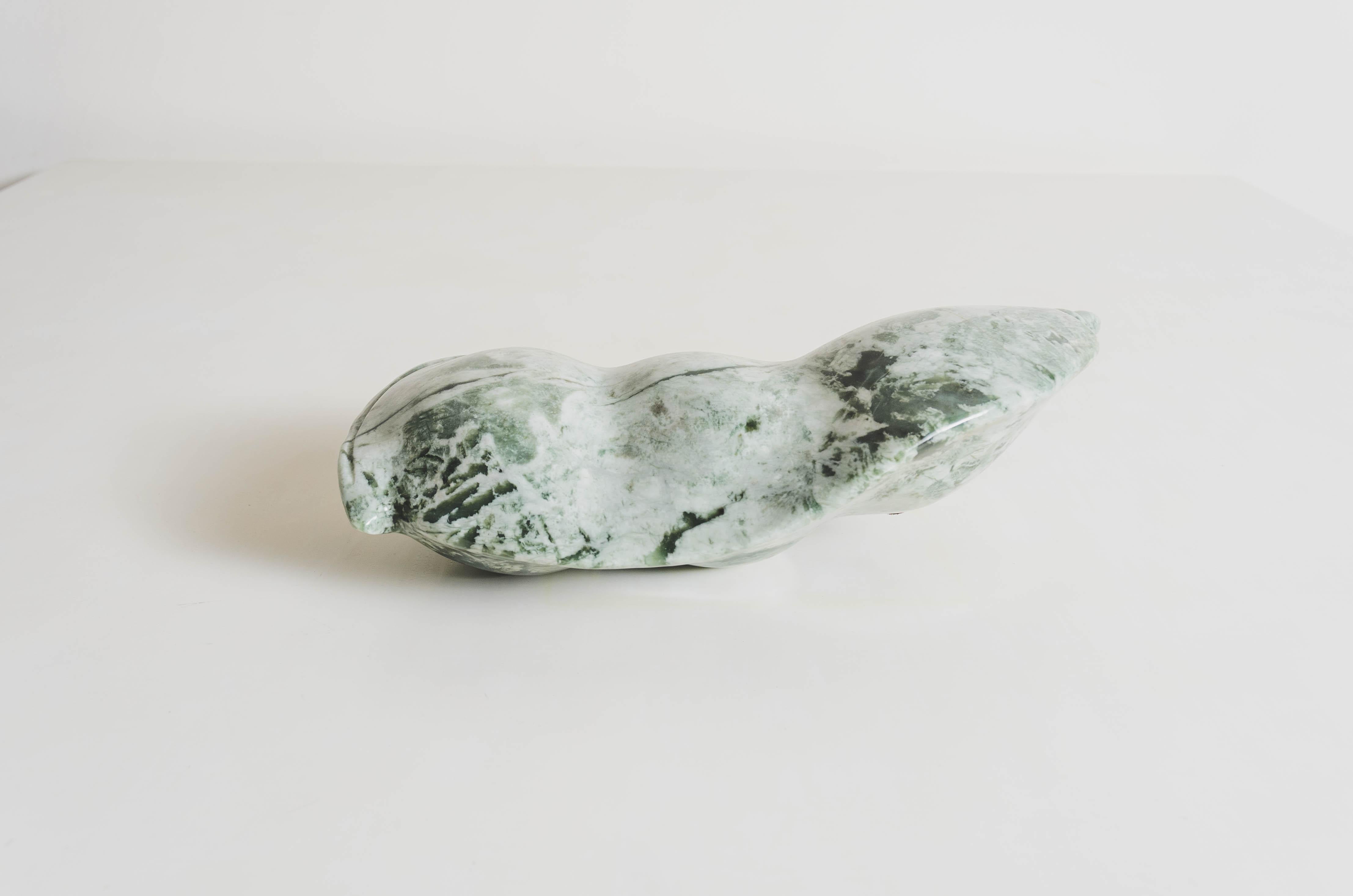 Lima bean sculpture
Nephrite Jade
Hand carved
Limited edition

Known as the “Stone of Heaven,” Nephrite Jade is prized for both its aesthetic beauty and symbolic value, with the ancient Chinese believing it to be a bridge between heaven and