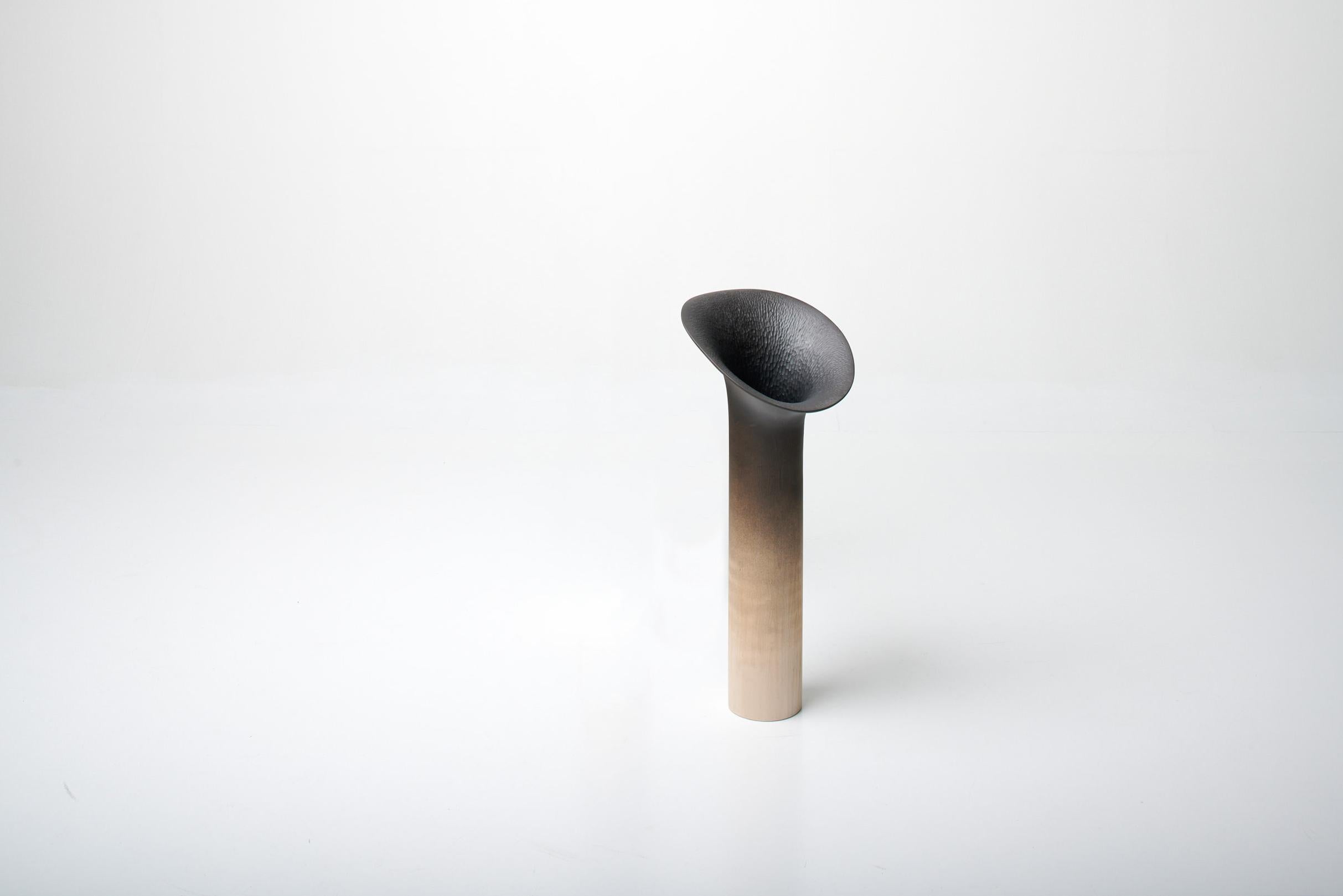 SISIN (finnish for “quiddity”) is a sculptural hand carved vessel series where the forms and textures are inspired by exceptional beauty and necessity of mushrooms.

Hollow pedestals give the pieces lightness and creates illusion regarding to the