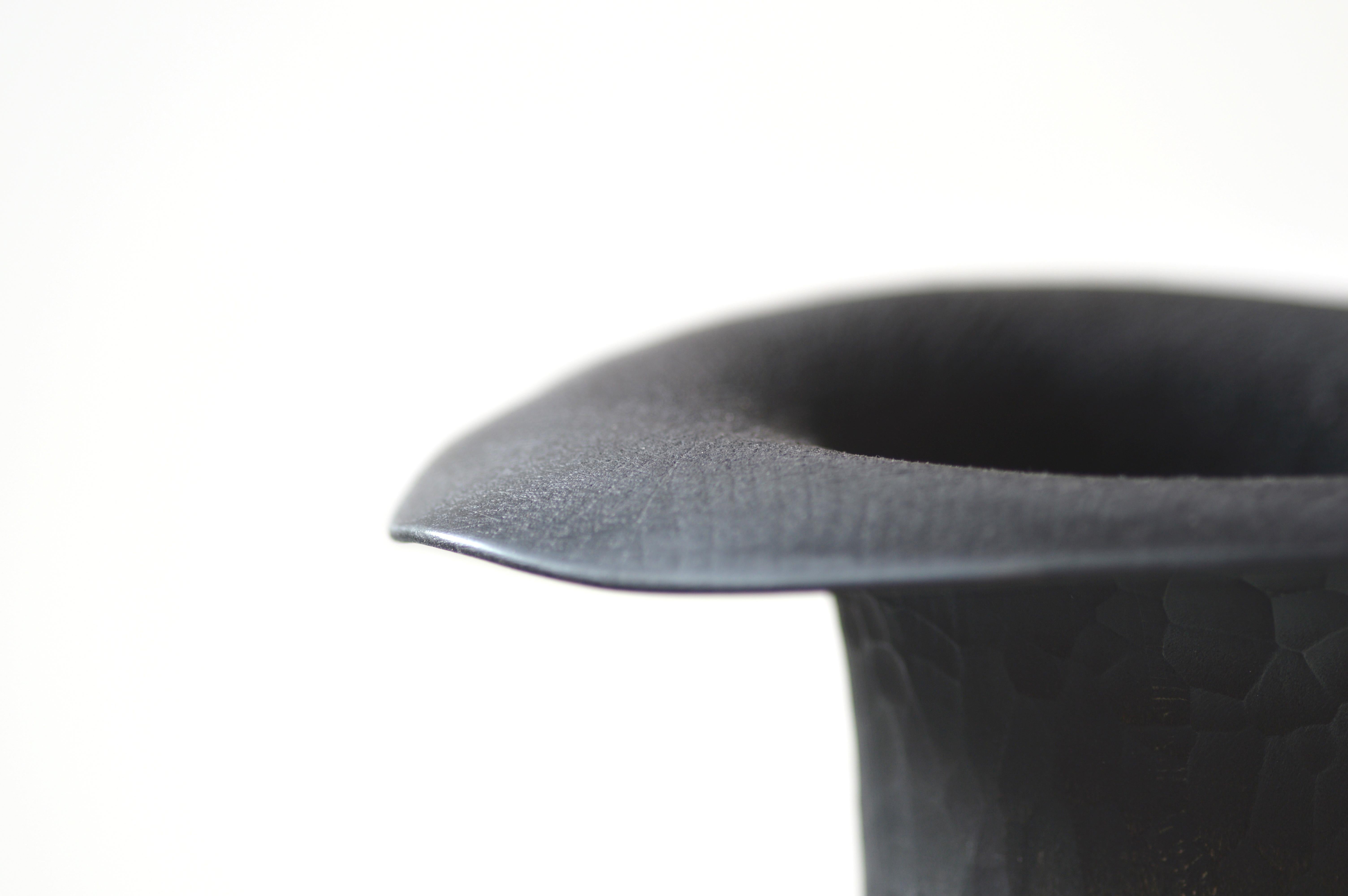 SISIN (finnish for “quiddity”) is a sculptural hand carved vessel series where the forms and textures are inspired by exceptional beauty and necessity of mushrooms.

Hollow pedestals give the pieces lightness and creates illusion regarding to the