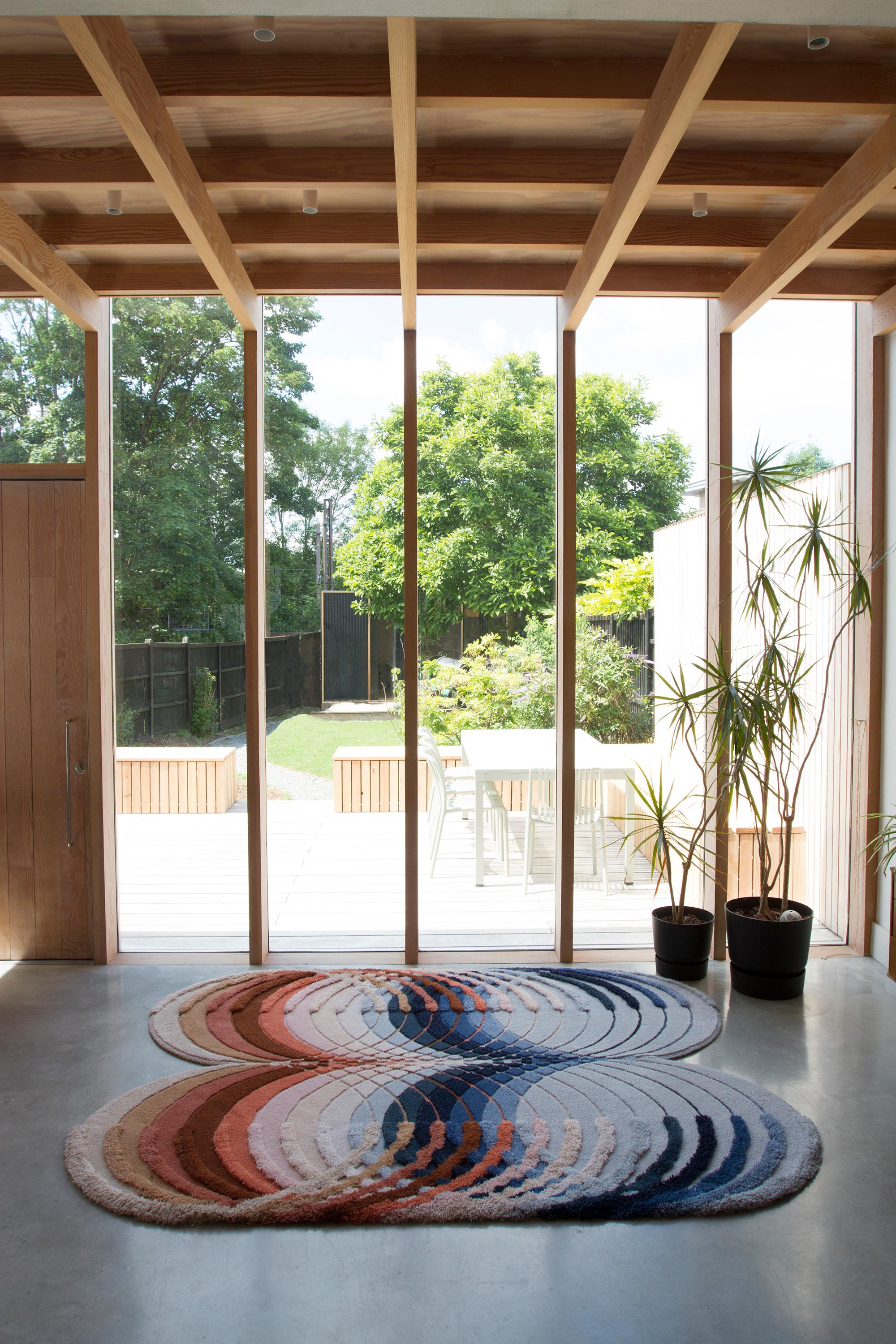 Modern Blue, Pink, Brown patterned contemporary hand crafted tufted British wool rug For Sale