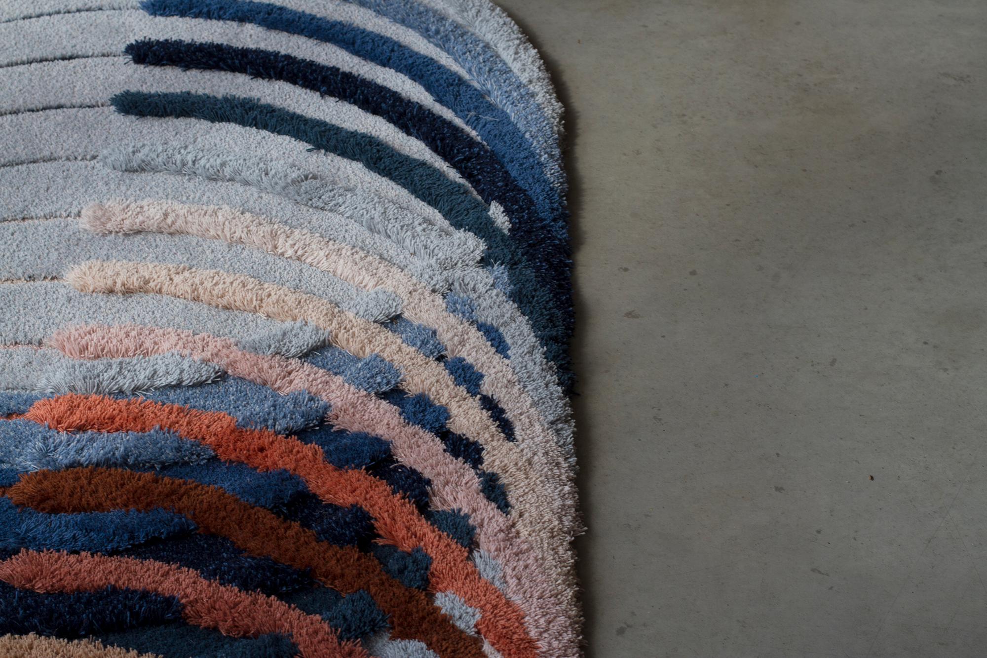 Hand-Crafted Blue, Pink, Brown patterned contemporary hand crafted tufted British wool rug For Sale