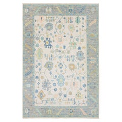 Zeitgenössischer handgeknüpfter floraler Wollteppich im Oushak-Stil in Beige