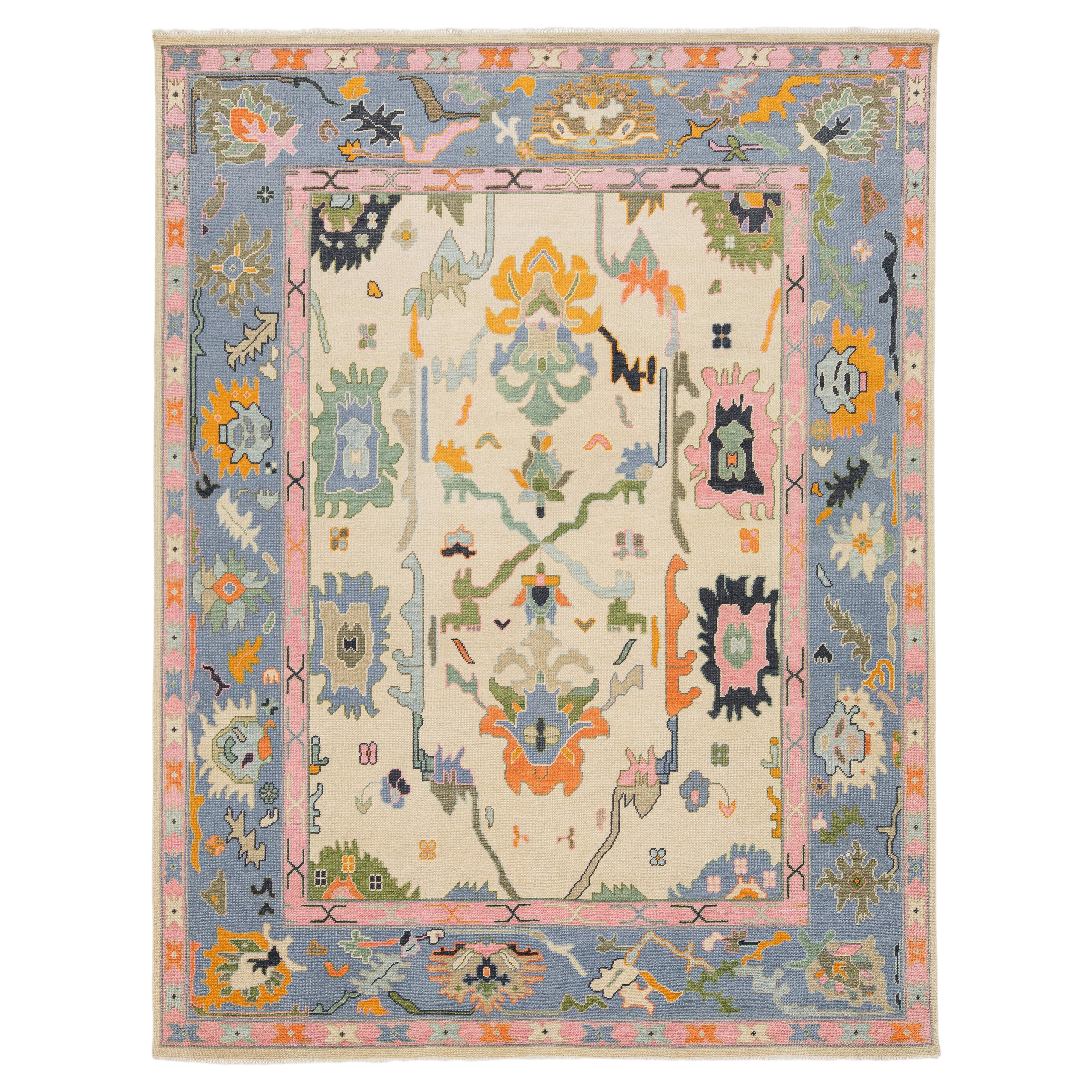 Contemporary Hand-Knotted Oushak Style Wool Rug in Ivory, Soft Blue, & Pastel