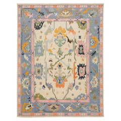 Contemporary Hand-Knotted Oushak Style Wool Rug in Ivory, Soft Blue, & Pastel