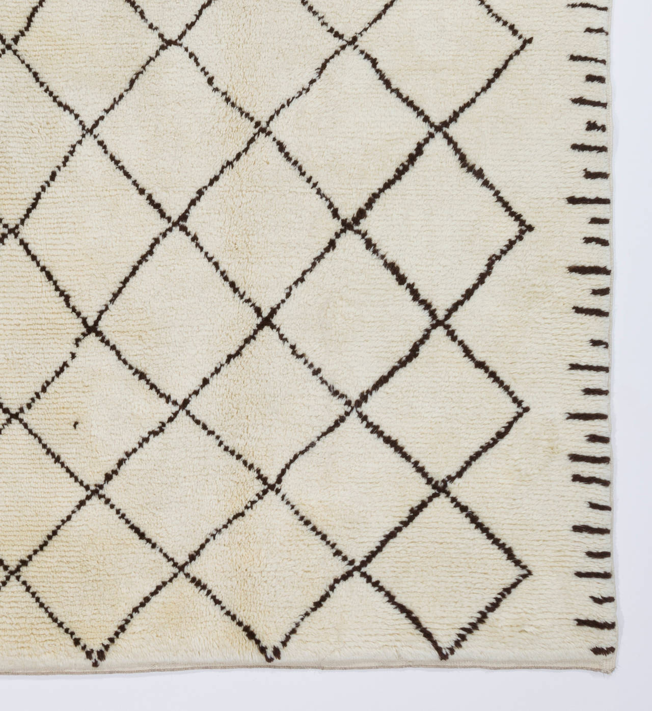 100% Natural Hand-Spun Wool of finest quality.

These hand-knotted rugs are produced from scratch in our atelier located in Central Anatolia, famous for being one of the world's oldest handmade rug making centers.

All our weavers are adult female