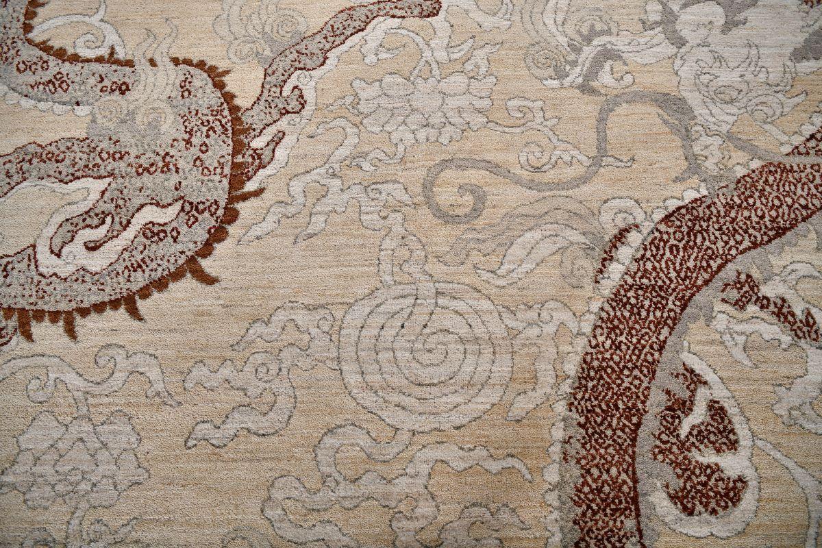 Very special Tian Druck ( dragon in Butanese) rug hand knotted by the skilled hands of artisans in Lahore, Punjiab. It is made entirely from pure Ghazni wool with a mix of colors designed to give this delicate and nuanced effect.

You can customize