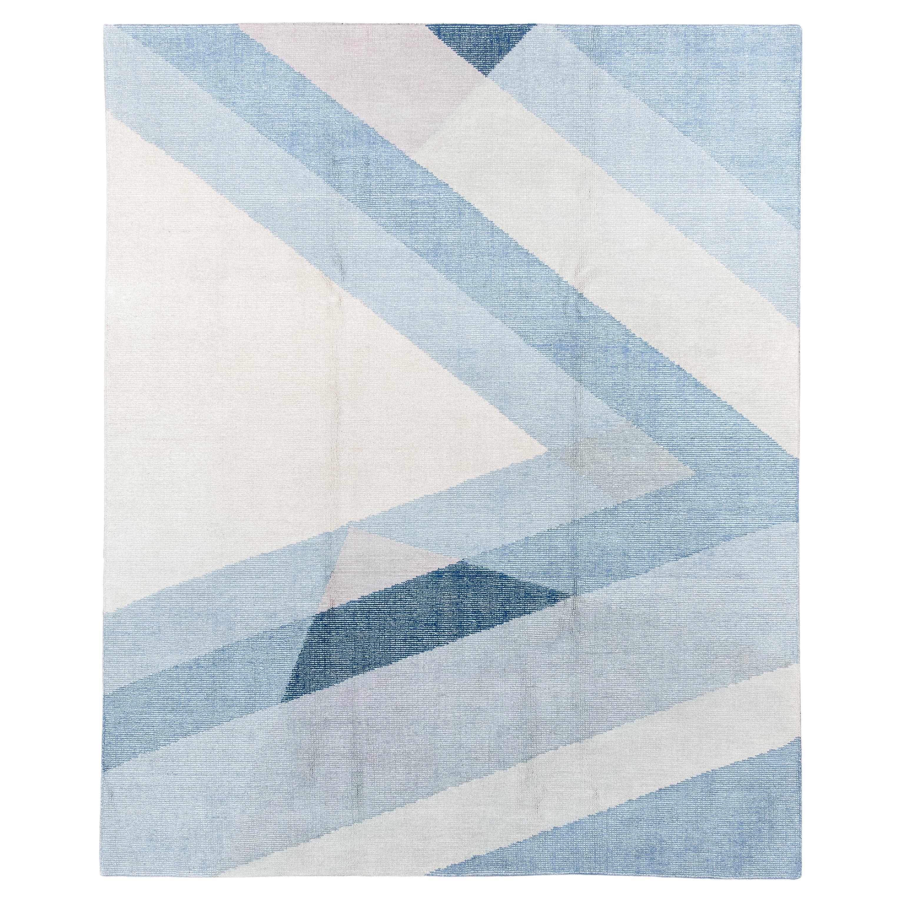 Tapis contemporain tissé à la main - Motif géométrique diagonal en bleu glacier et ivoire