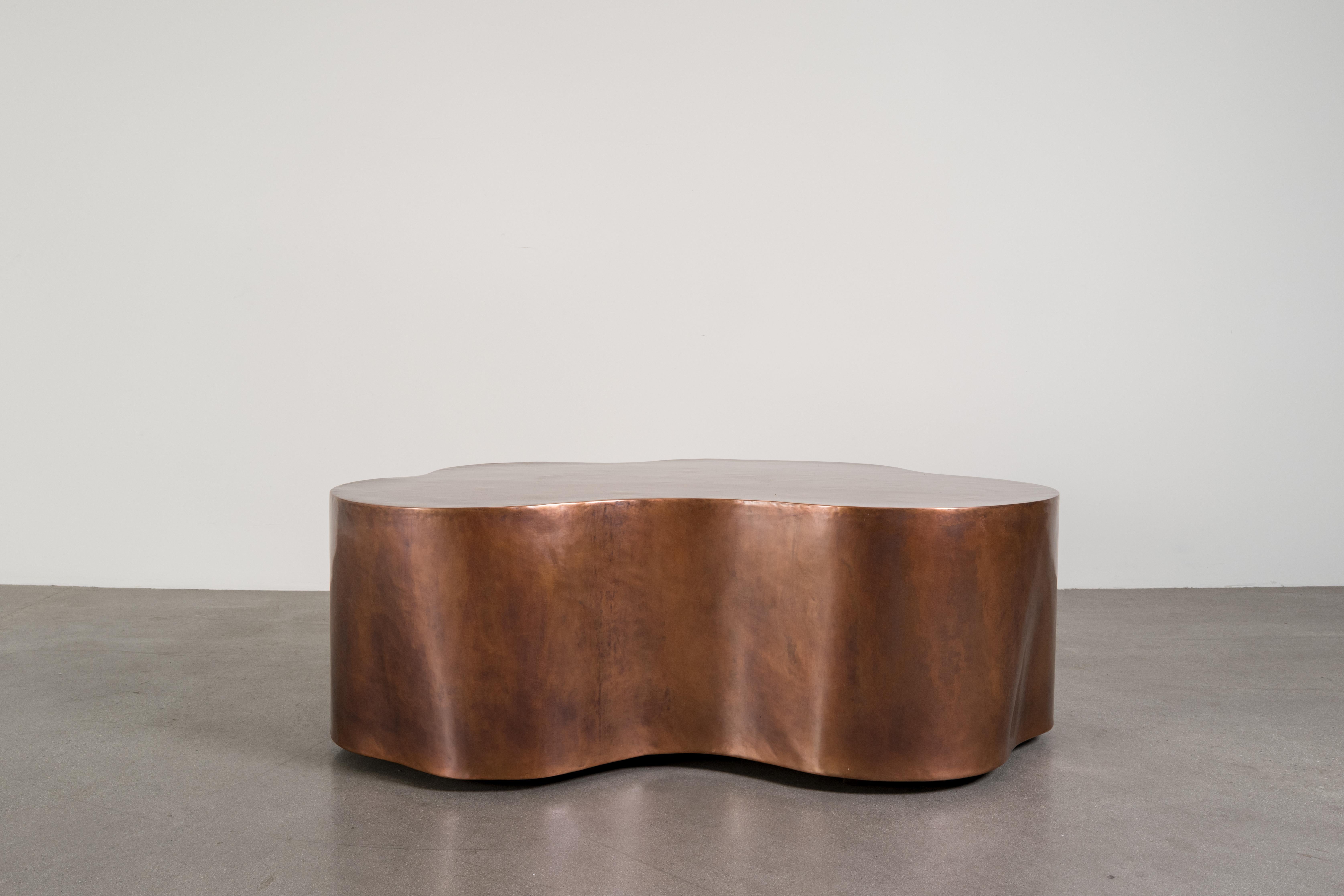 Root Cocktail Table 
Antiqued Copper
Hand Repoussé
Copper
Limited Edition
Contemporary
Each piece is individually crafted and is unique. 

Repoussé is the traditional art of hand-hammering decorative relief onto sheet metal. The technique originated