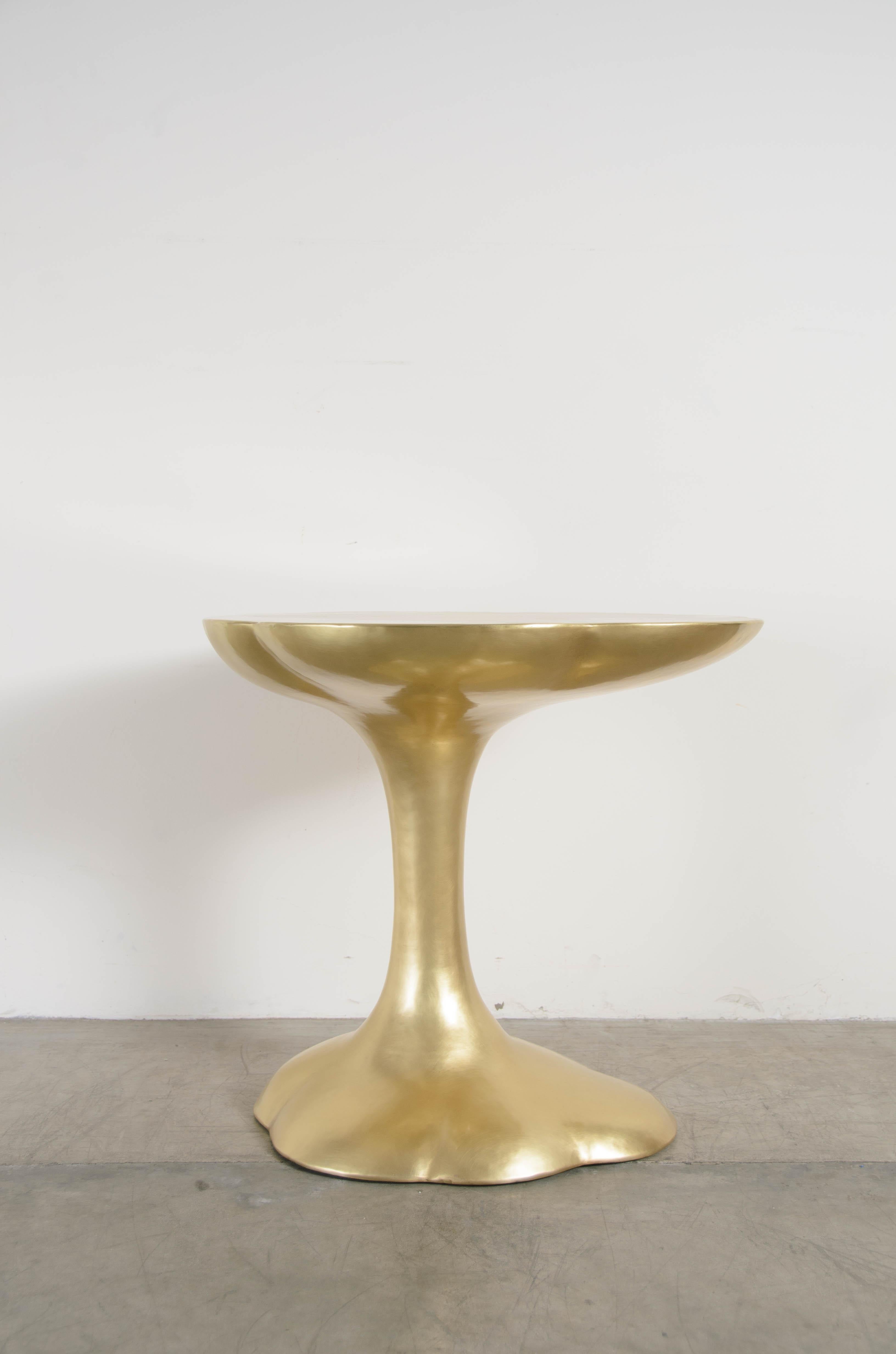 Nuage side table 
Brass
Hand repoussé
Limited edition
Each piece is individually crafted and is unique. 
Repoussé is the traditional art of hand-hammering decorative relief onto sheet metal. The technique originated around 800 BC between Asia