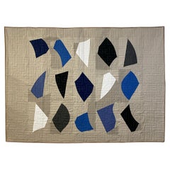 Contemporary hand-sewn Fragments quilt by British master maker