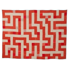 Contemporary hand-sewn Meander quilt by British master maker