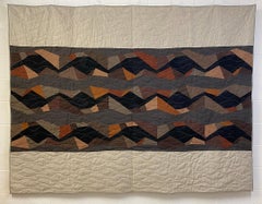 Contemporary hand-sewn Vortex quilt by British master maker