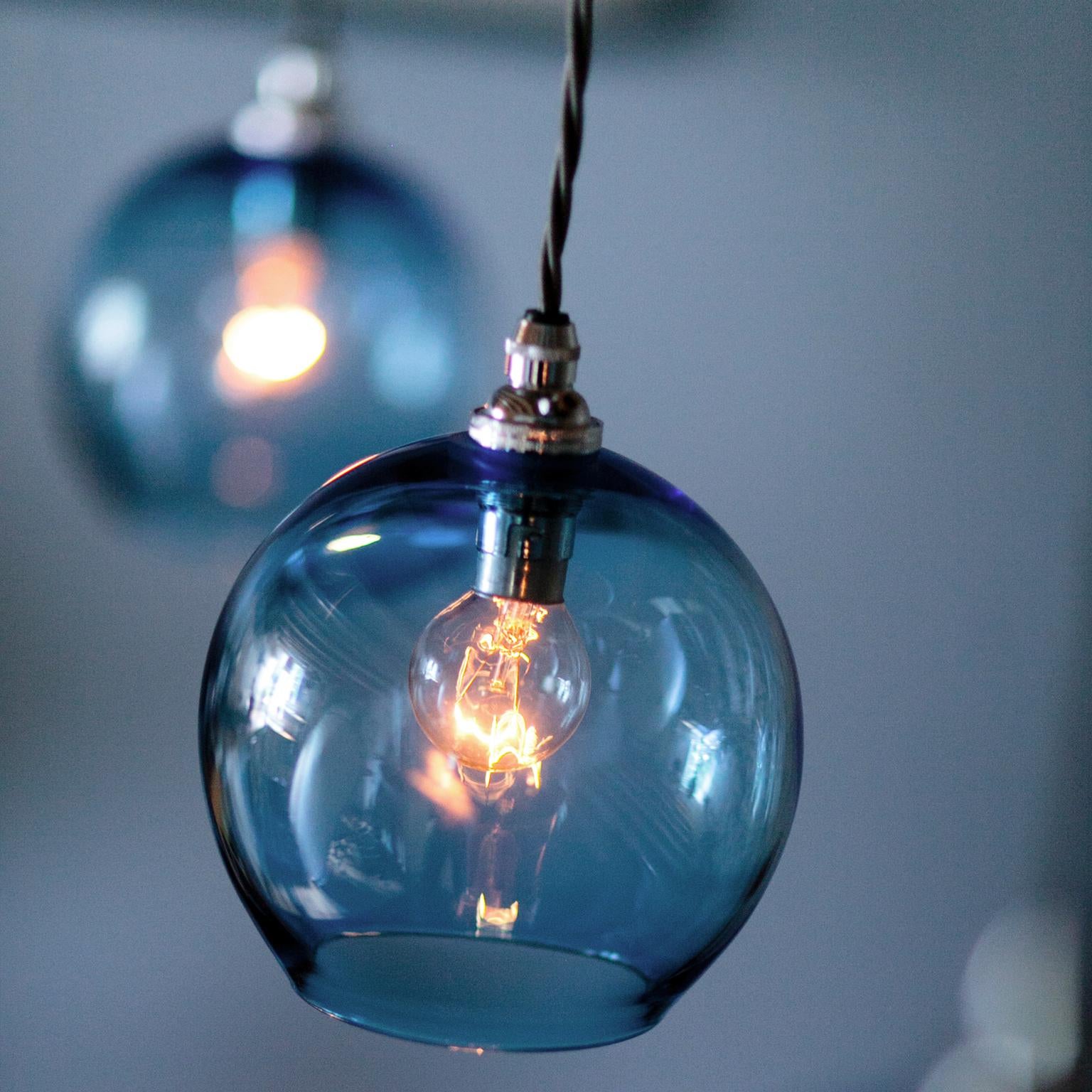 The Classic round glass can be custom made in four different sizes. Paired to sit beside a bed or found hanging in a three over a kitchen island, or as part of a multiple drop chandelier. These pendants can be mixed and matched in any colour