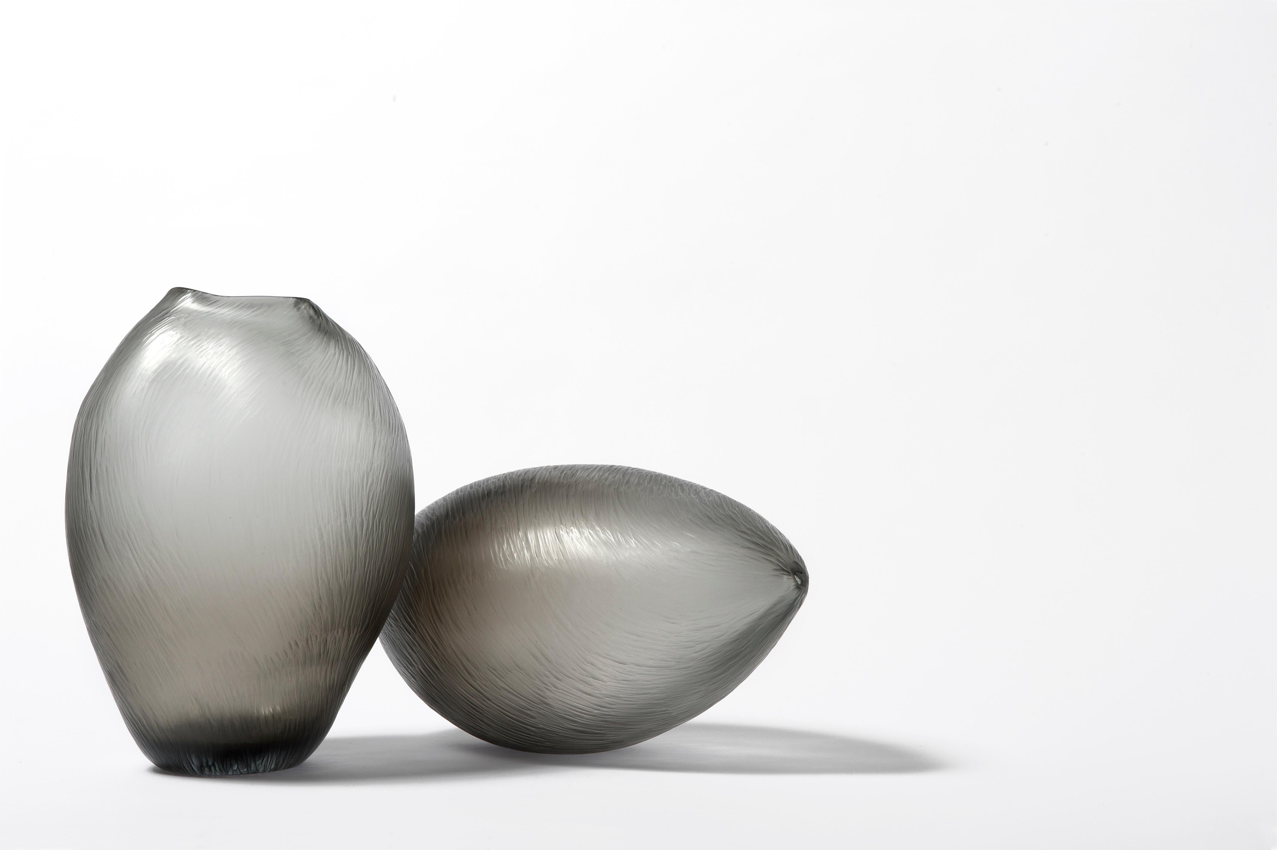 Contemporary glass sculpture with grey-tone shading, executed in Murano, Venice, Italy. Designed by Michela Cattai. 

Michela Cattai's series of Chiaroscuro works were inspired by the painting technique of the same name favoured by the great