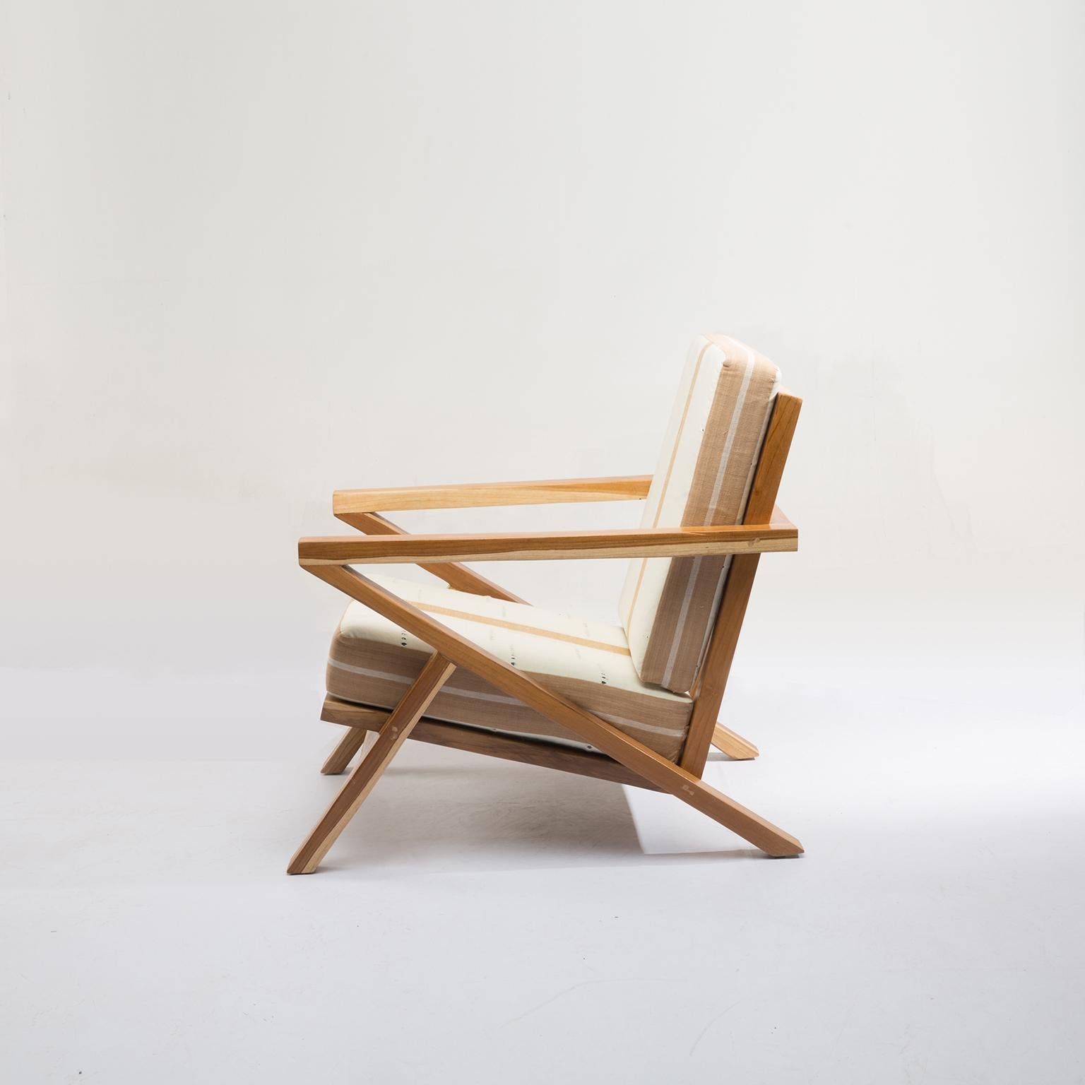 ilé-ilà (House of Lines) is a lifestyle furniture-line designed and handmade in Lagos, Nigeria, West Africa. Kukuru Funfun translates as 'White Dove' and is the name of the chair seen here. It is upholstered in vintage Aso Oké, which is the