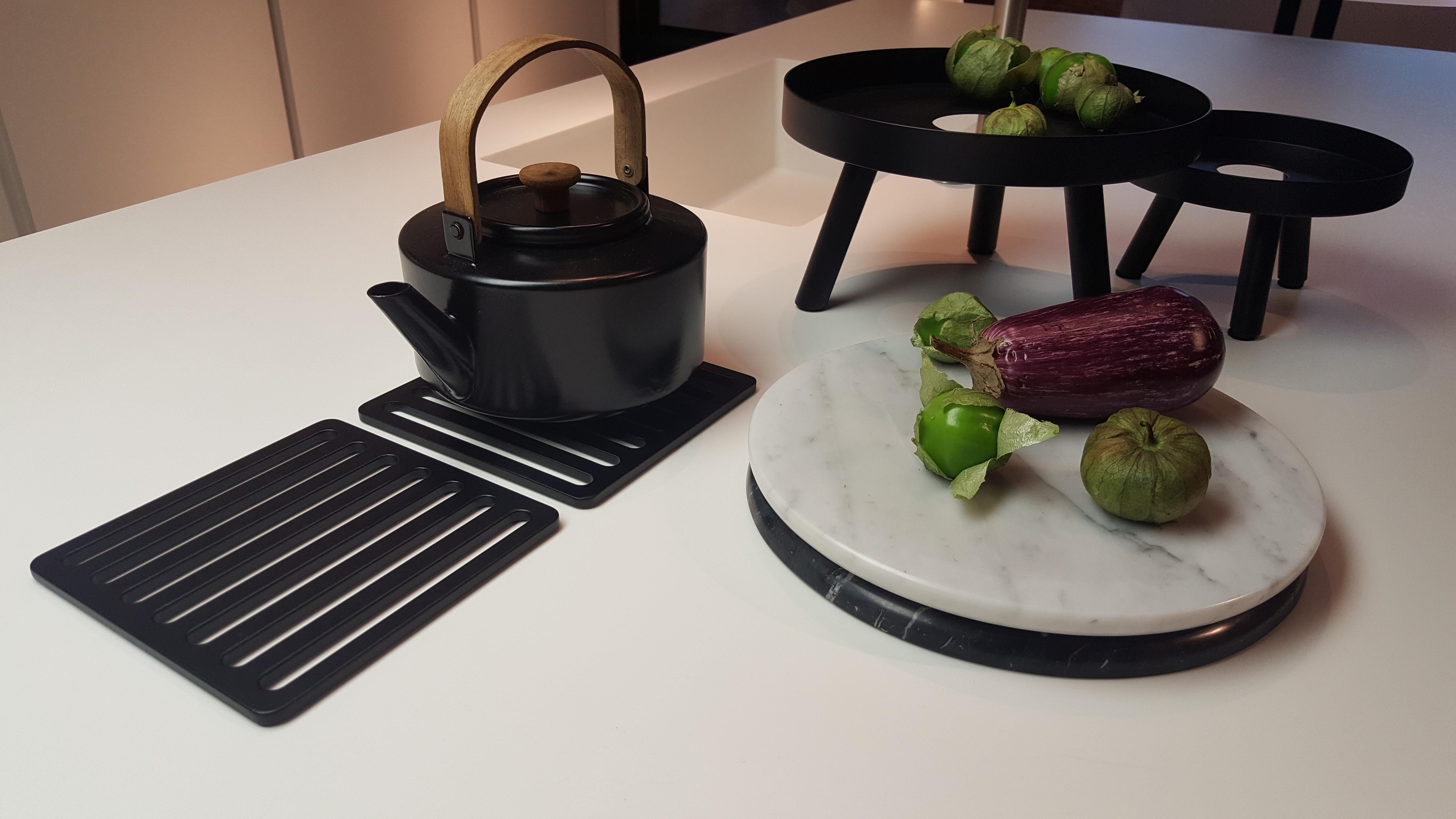 Inspired by the sidewalk grates in Milan, the Milan Trivet is a piece of Italy at home. Functional as a pedestal for your serving dishes, and uniquely appealing as a piece of decor for a modern curated kitchen.

Material: Anodized aluminum / solid