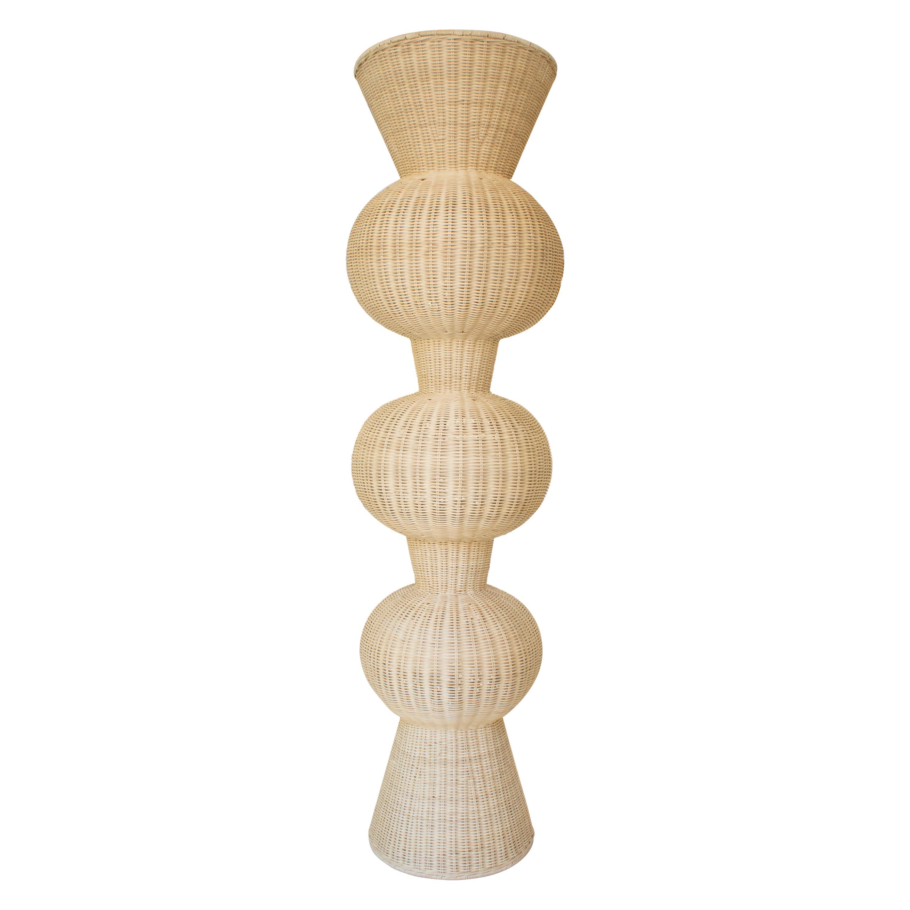 Contemporary Spanish Handcrafted floor lamp with 3-stacked ball shape globes made of wicker.