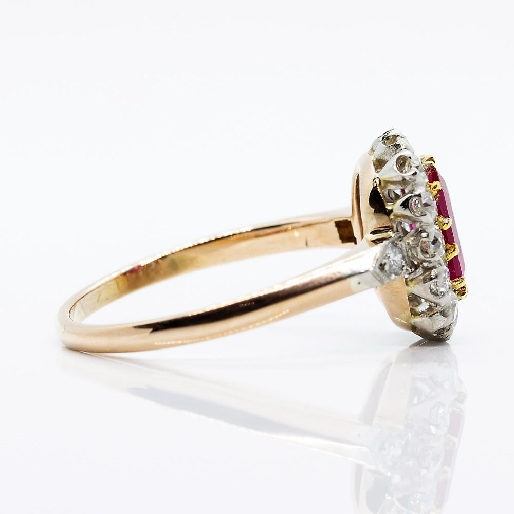  Composition: 18k Gold and platinum
Stones:
•	1 Natural Burma emerald cut ruby 1.02ctw
•	16 old mine cut diamonds H-VS2 0.60ctw
Ring size: 6 ½ 
Ring face:  12mm by 10mm
Rise above finger: 5mm.¬
Total weight:  3.3grams – 2.1dwt¬¬
Appraisal available