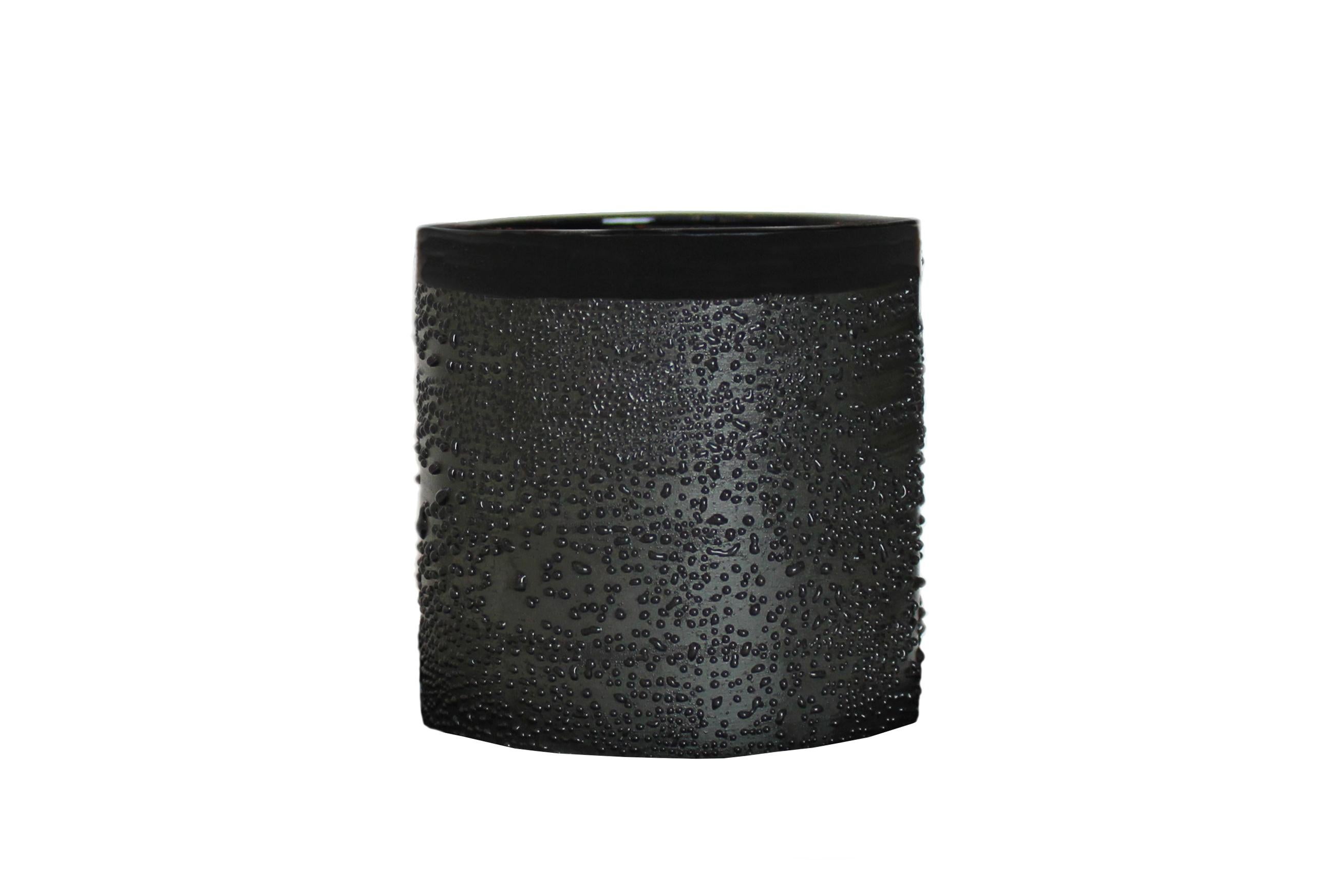 Handmade stoneware cup.  Glossy black interior and rim with textured dew glaze body.  Also available in white and brown.  Handmade by Malka Dina in Brooklyn, NY.
Due to the handmade nature of this item, each piece will be slightly unique and some