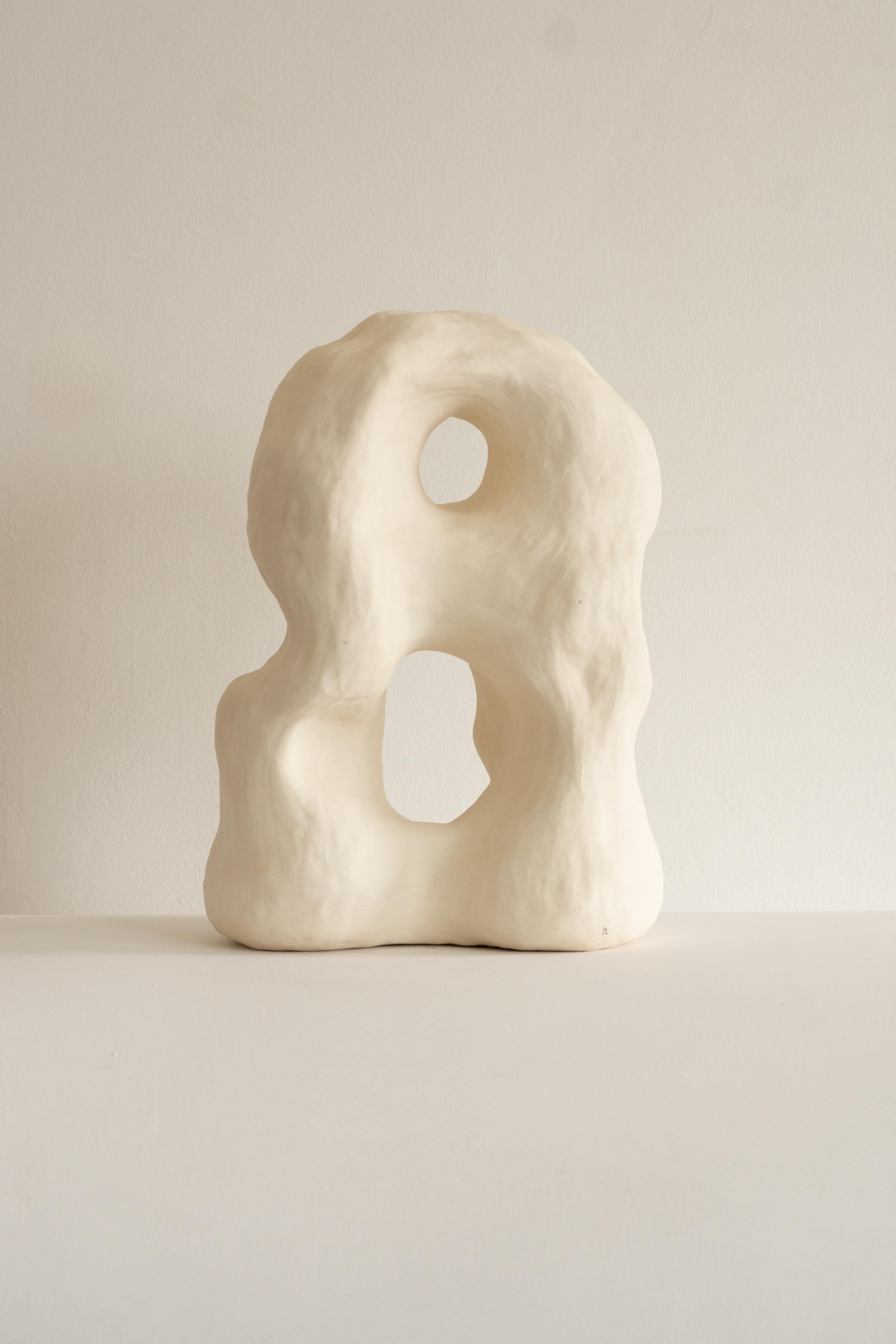 This sculpture is part of the Rupa series, a collection of handcrafted pieces crafted without molds that absorb the contours and textures of the craftsman's hand, transforming it into an object with a clean and complex shape.

The sculpture N.1 are
