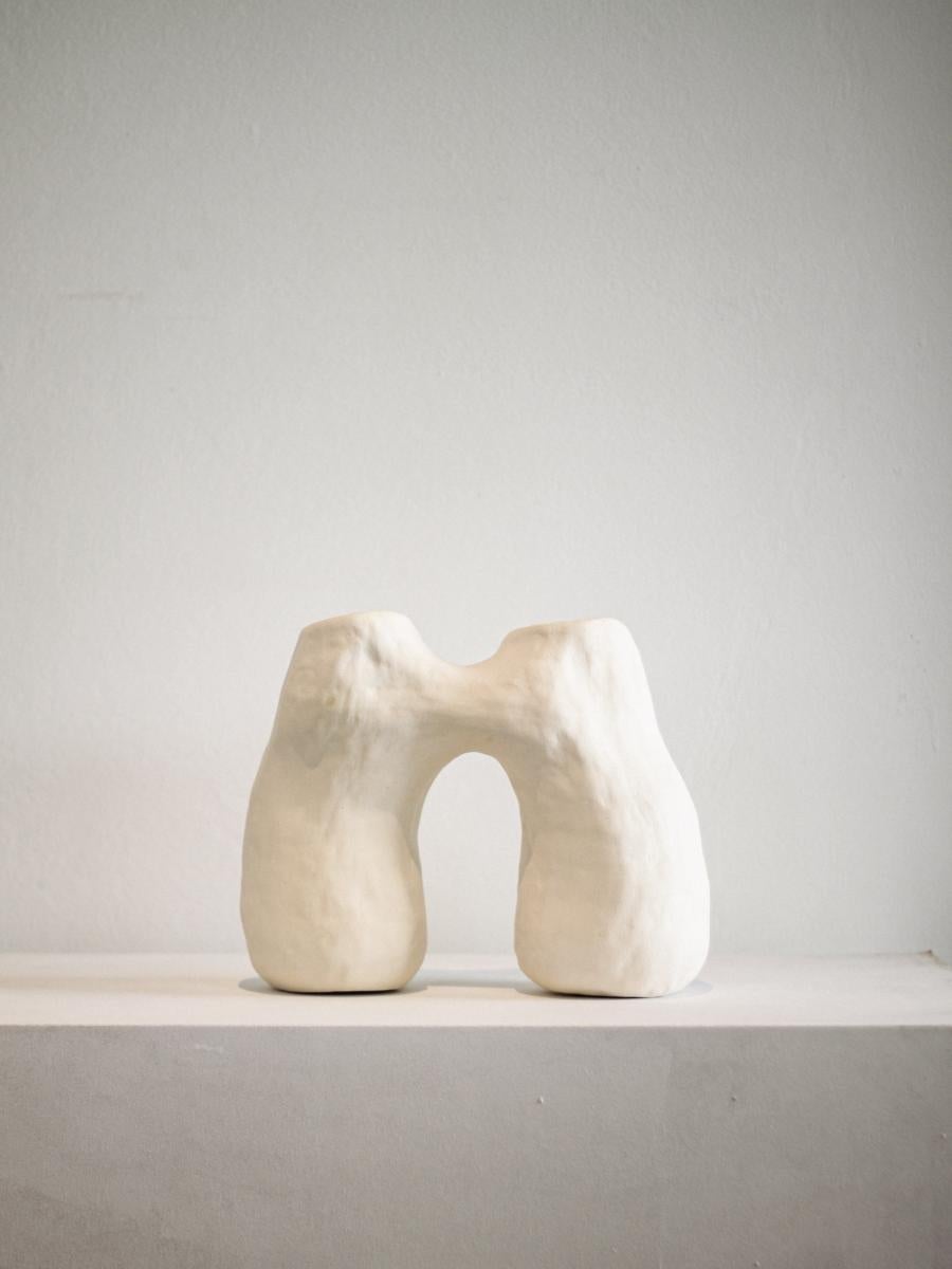 This sculpture is part of the Rupa series, a collection of handcrafted pieces crafted without molds that absorb the contours and textures of the craftsman's hand, transforming it into an object with a clean and complex shape.

The sculpture N.3 are