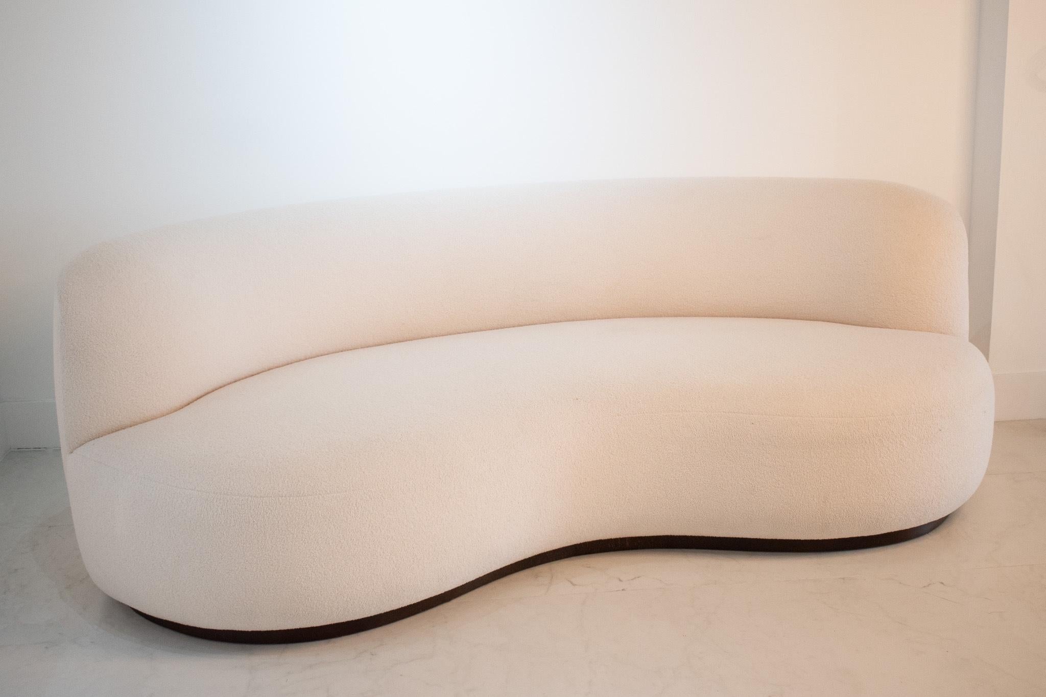 The 'Cloud' sofa is handmade in the UK with a dowelled ply frame. This makes it highly customisable, both in size and fabric. any length is possible and we have a range of fabrics to choose from.

A popular piece in our showroom, this curved sofa in