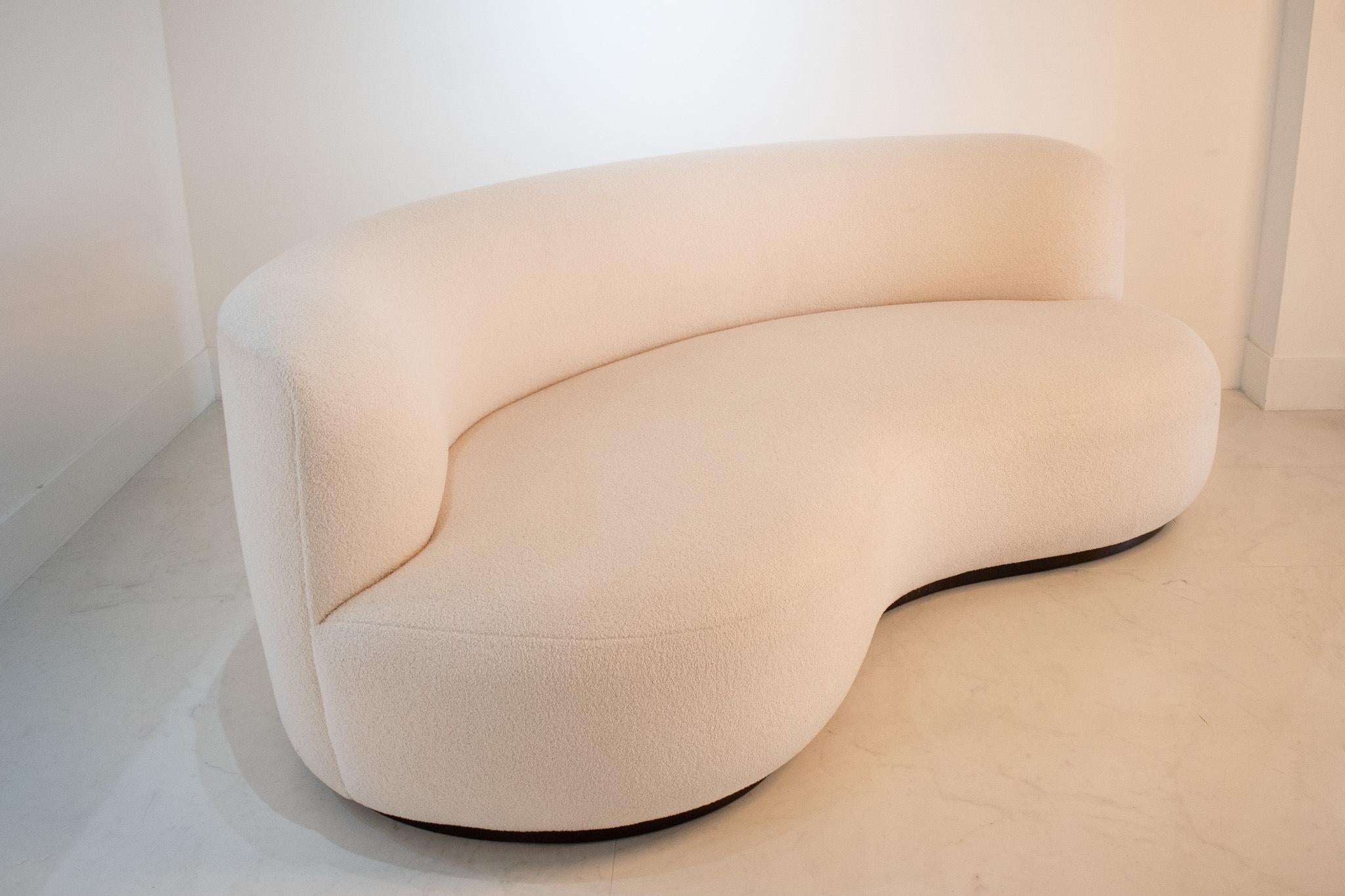 curved white sofa