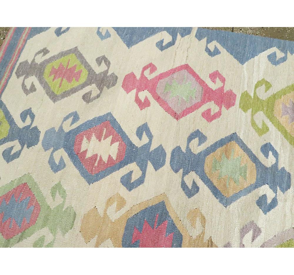 Wool Contemporary Handmade Flat-Weave Rug in Grey, Beige, Pink, Blue, and Green