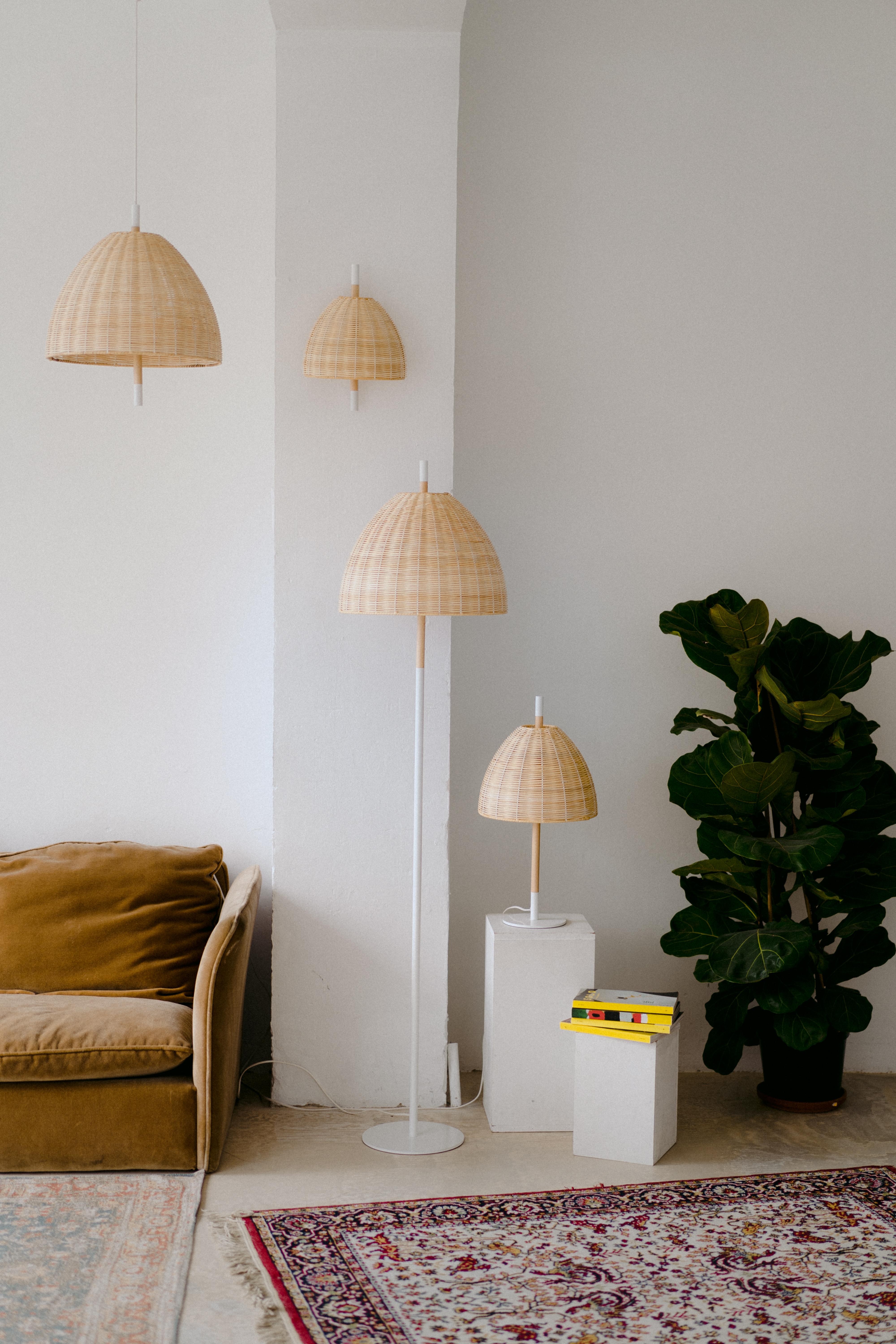 AMÀ - Floor lamp

Amà , comes from the Catalan '' a mà '', which means '' handmade '', and it is how this contemporary lamp is made. With hand-turned beech wood, white metal details, and hand-woven lampshade in natural rattan.
Mediterranean, simple,