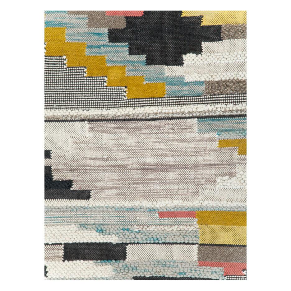 A modern Persian flatwoven Kilim accent rug handmade during the 21st century.

Measures: 5' 3