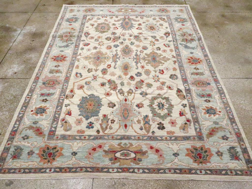 A modern Persian Sultanabad small room size carpet handmade in the 21st century.

Measures: 7' 11