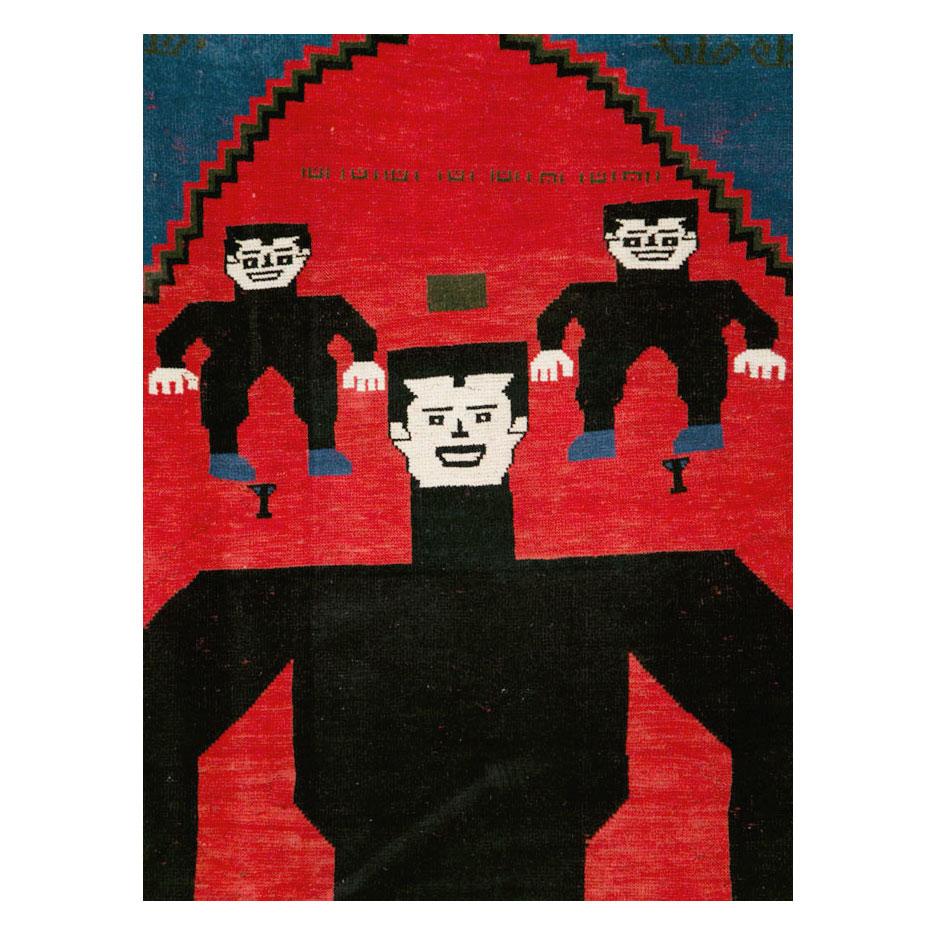 Ein moderner afghanischer Akzentteppich, handgefertigt im 21. Jahrhundert, mit einer bildlichen Darstellung der Figur des Horror-Klassikers Frankenstein.

Maße: 6' 9