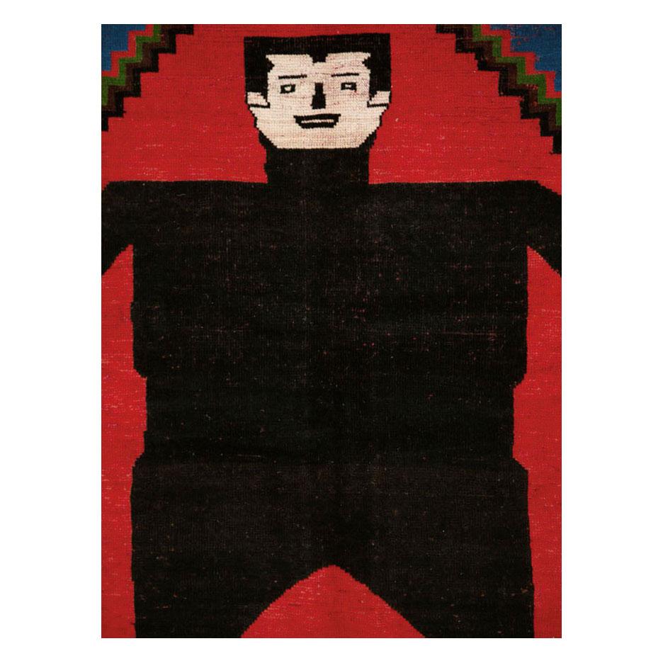 A modern Afghan accent rug handmade during the 21st century with a pictorial depiction of the horror Classic character, Frankenstein.

Measures: 6' 11