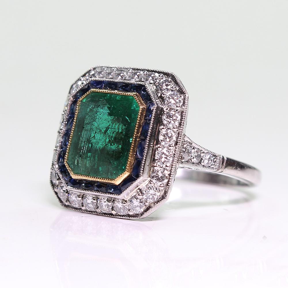 Contemporary Handmade Platinum 3 Carat Emerald Diamond and Sapphire Ring In Excellent Condition In Miami, FL