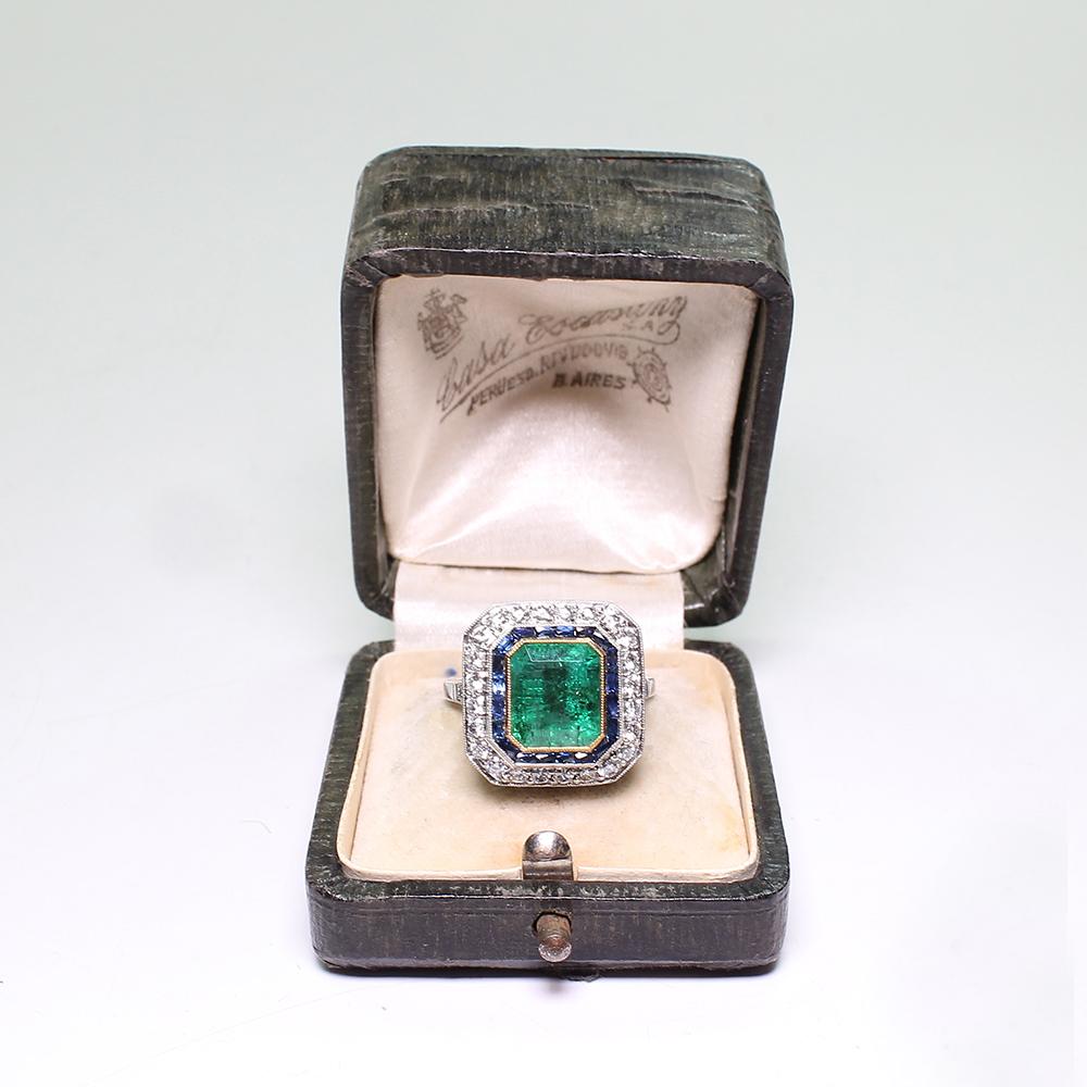 Contemporary Handmade Platinum 3 Carat Emerald Diamond and Sapphire Ring 2
