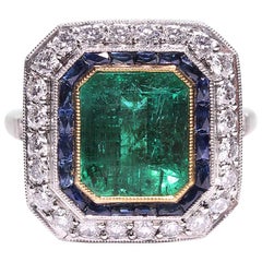 Contemporary Handmade Platinum 3 Carat Emerald Diamond and Sapphire Ring