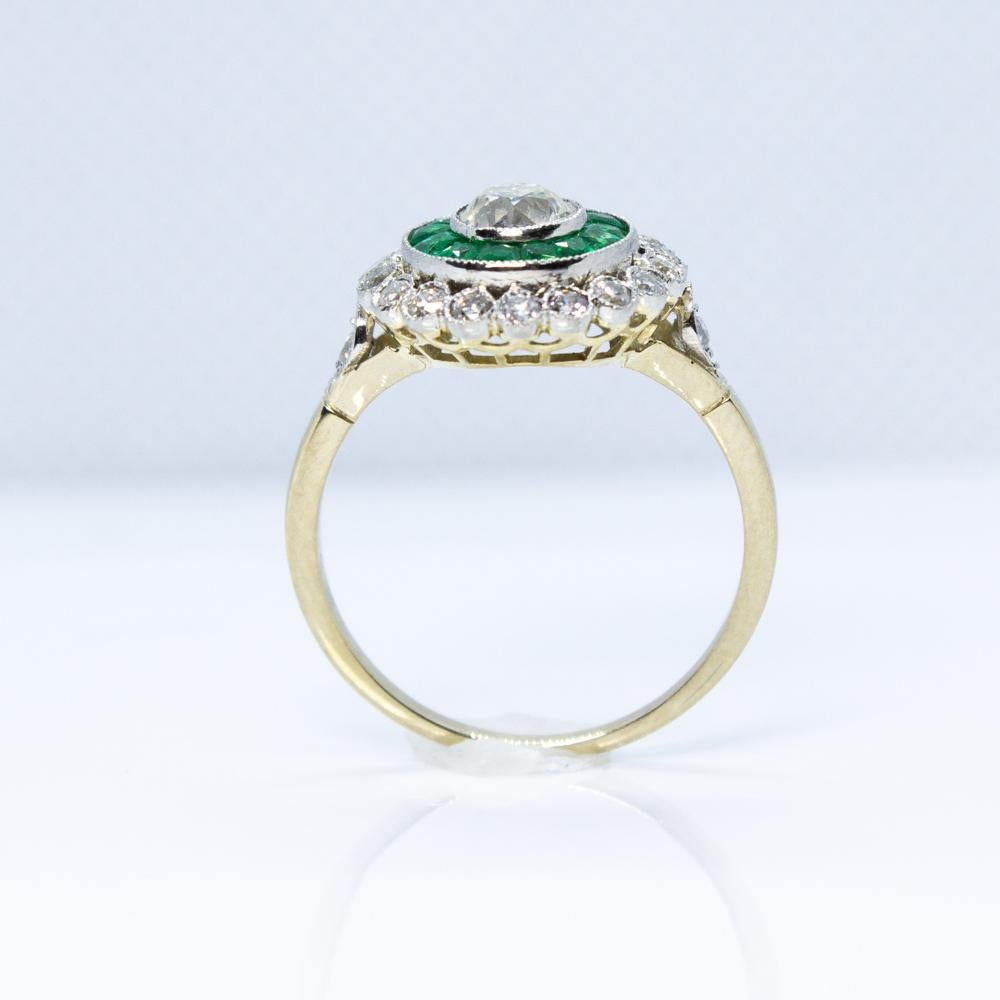 Contemporary Handmade Platinum Diamond and Emerald Ring 1