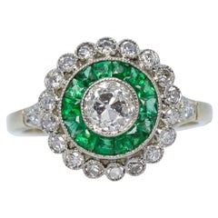 Contemporary Handmade Platinum Diamond and Emerald Ring