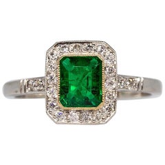 Contemporary Handmade Platinum Diamond and Emerald Ring