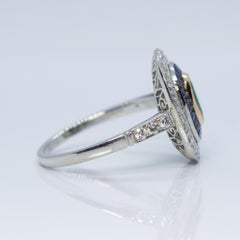 Contemporary Handmade Platinum Emerald, Sapphire and Diamond Ring