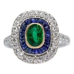 Contemporary Handmade Platinum Emerald, Sapphire and Diamond Ring