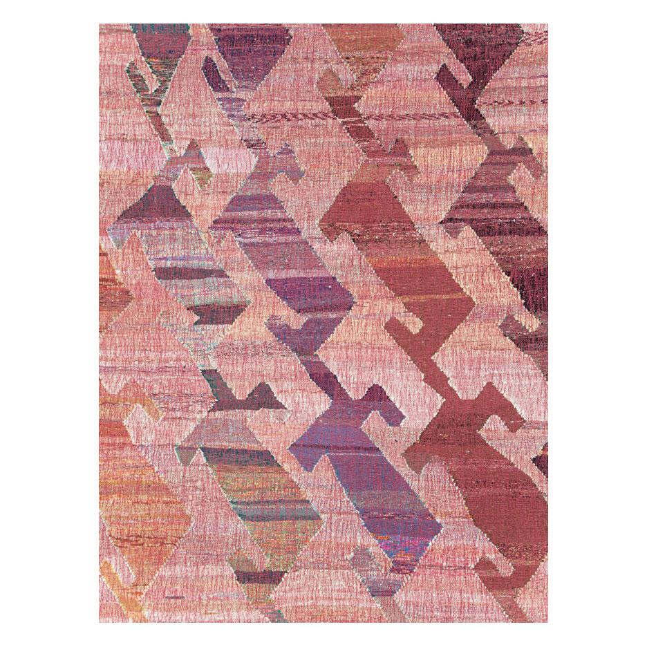 A modern Turkish flat-weave Kilim large room size carpet handmade during the 21st century with a large-scale geometric contemporary pattern in ruby red.

Measures: 13' 6