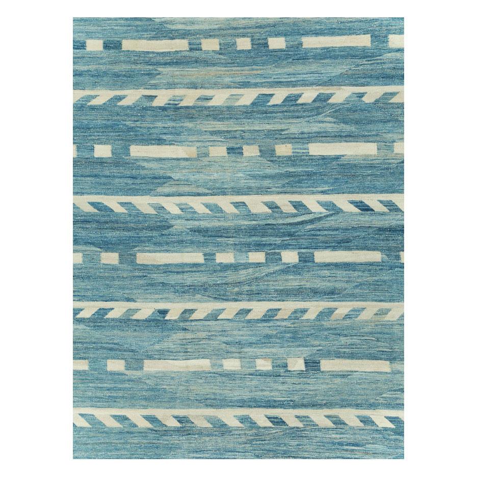 A modern Turkish flatweave Kilim oversize carpet handmade during the 21st century.

Measures: 14' 7