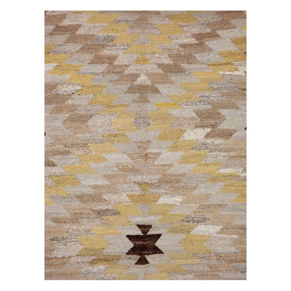 A modern Turkish flat-woven Kilim room size carpet handmade during the 21st century.

Measures: 8' 2