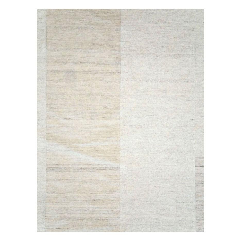 A modern Turkish flat-weave Kilim room size rug handmade during the 21st century with 6 subtly striated light beige and linen columns.

Measures: 10' 1