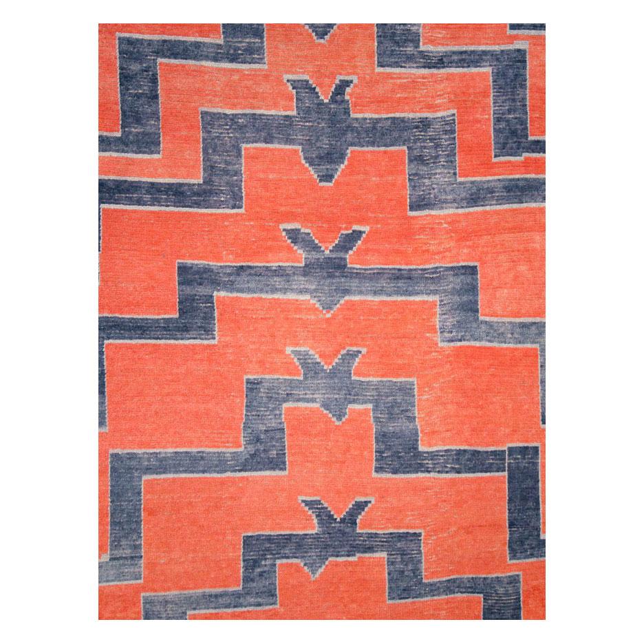A modern Turkish Tulu large room size rug with a low shaggy pile handmade during the 21st century. The geometric 